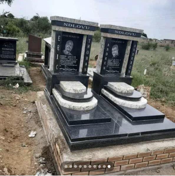 Ndlovu double tombstone with photo portraits in grey and black granite